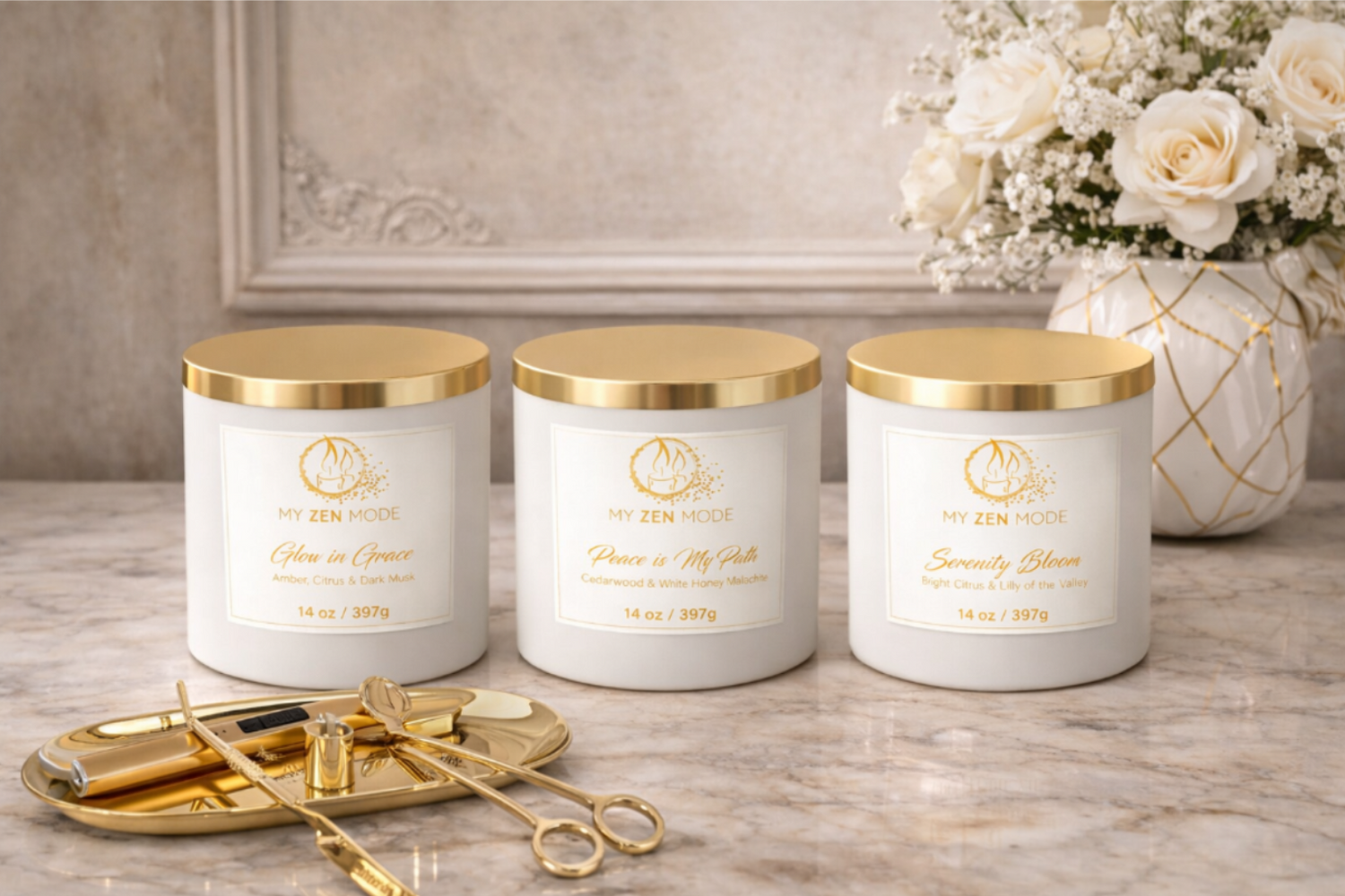 Three candles with gold lids on a wooden surface, accompanied by decorative items and flowers.